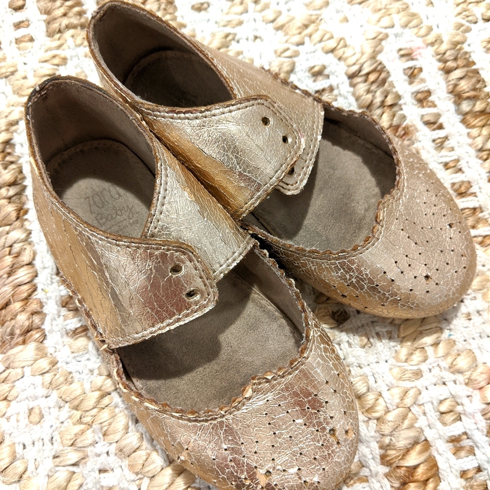 Two pair of gold shoes Zara and Child's Place